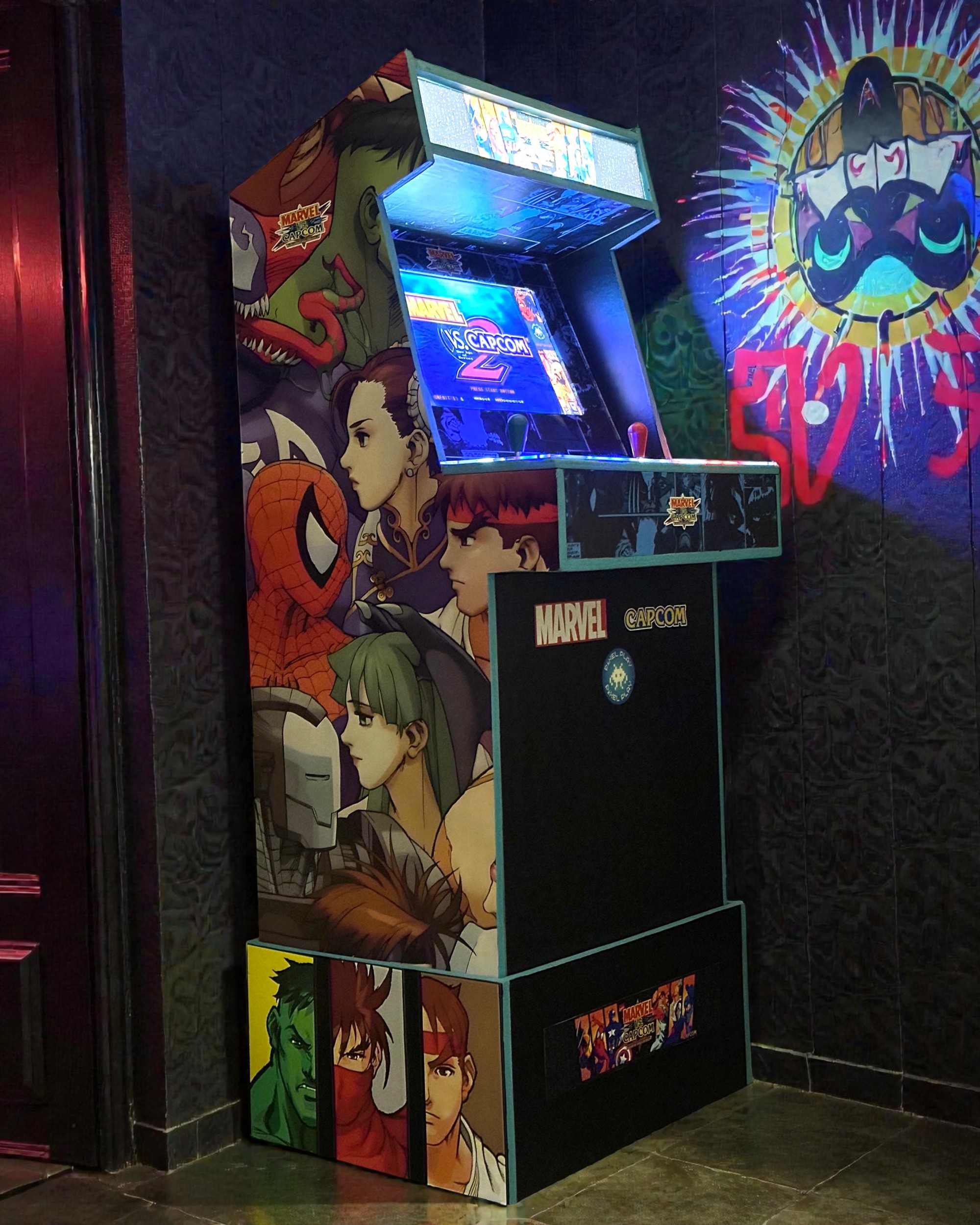 Pixel Play Marvel vs Capcom arcade cabinet installed at a venue
